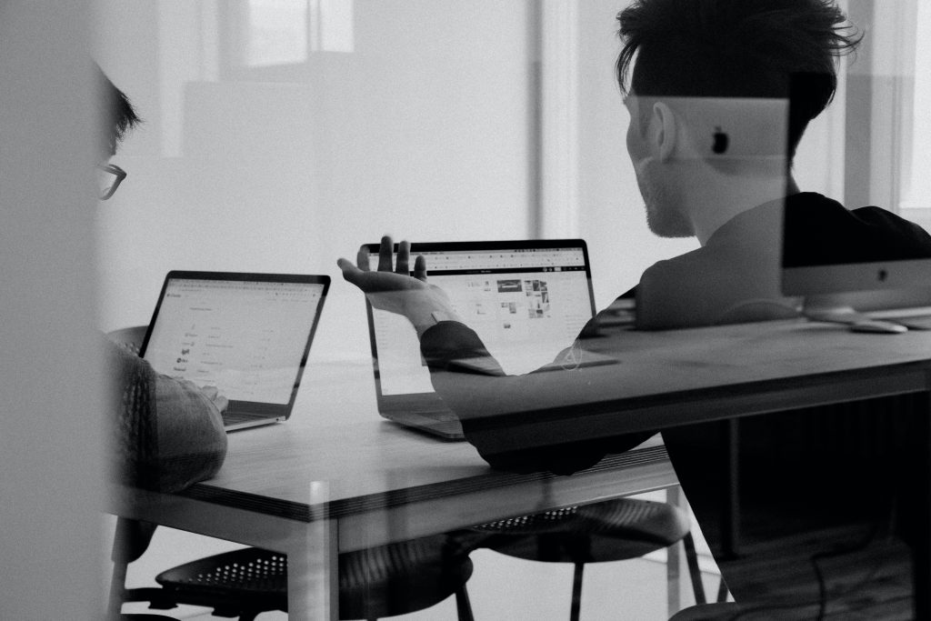 A man looking at a laptop