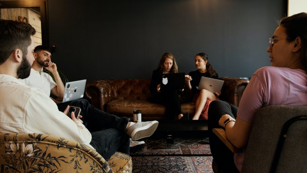 A group of people sitting in a circle